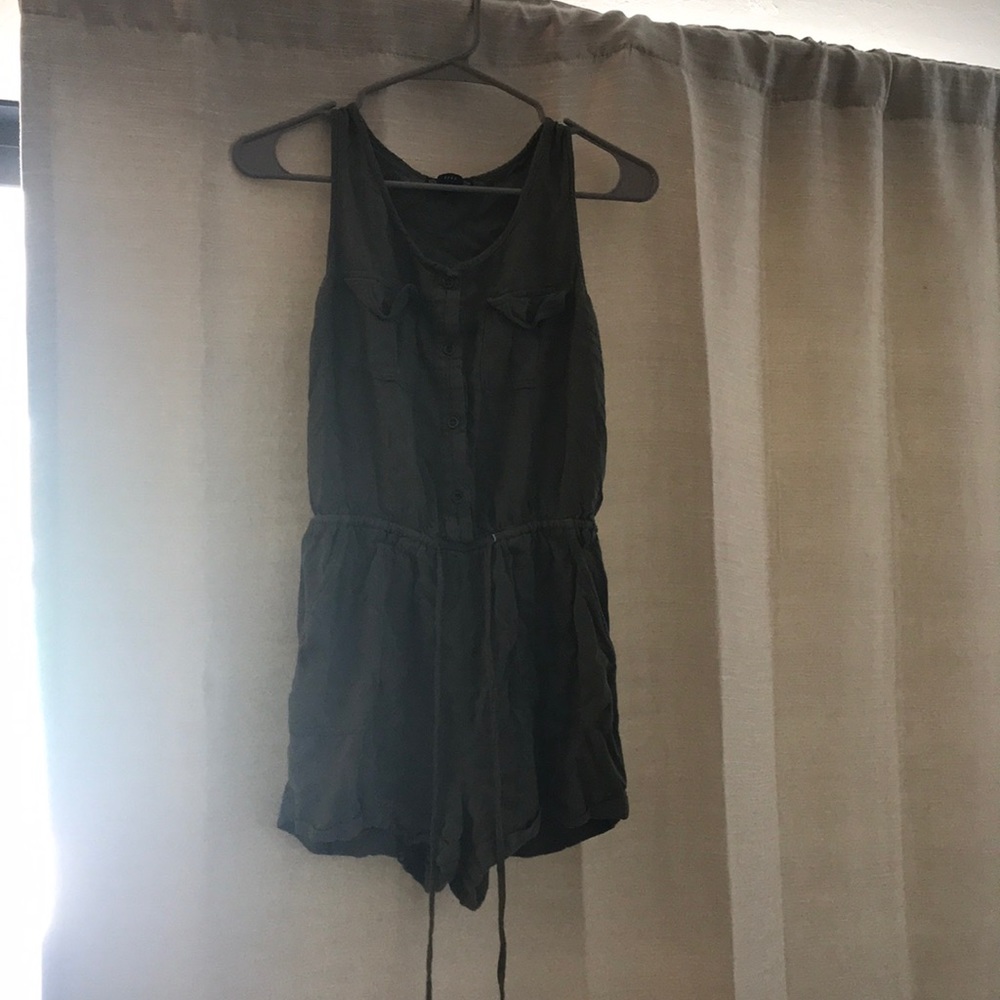 Green romper with pockets